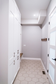 This mud room was built right off the garage, so the family could organize all their items before entering the home.